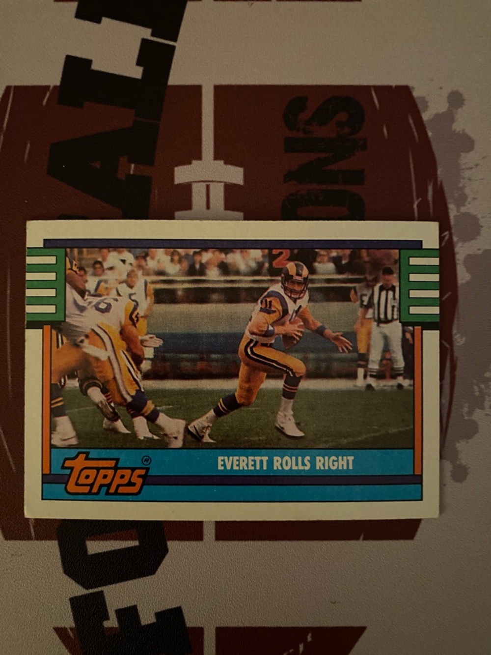 Topps Football Card with Teal, Orange, Yellow & Blue Accents 1990